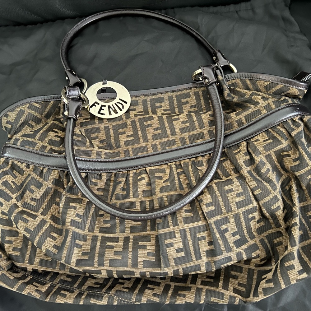 Used 100% original Fendi Zucca large Tote with dust bag..